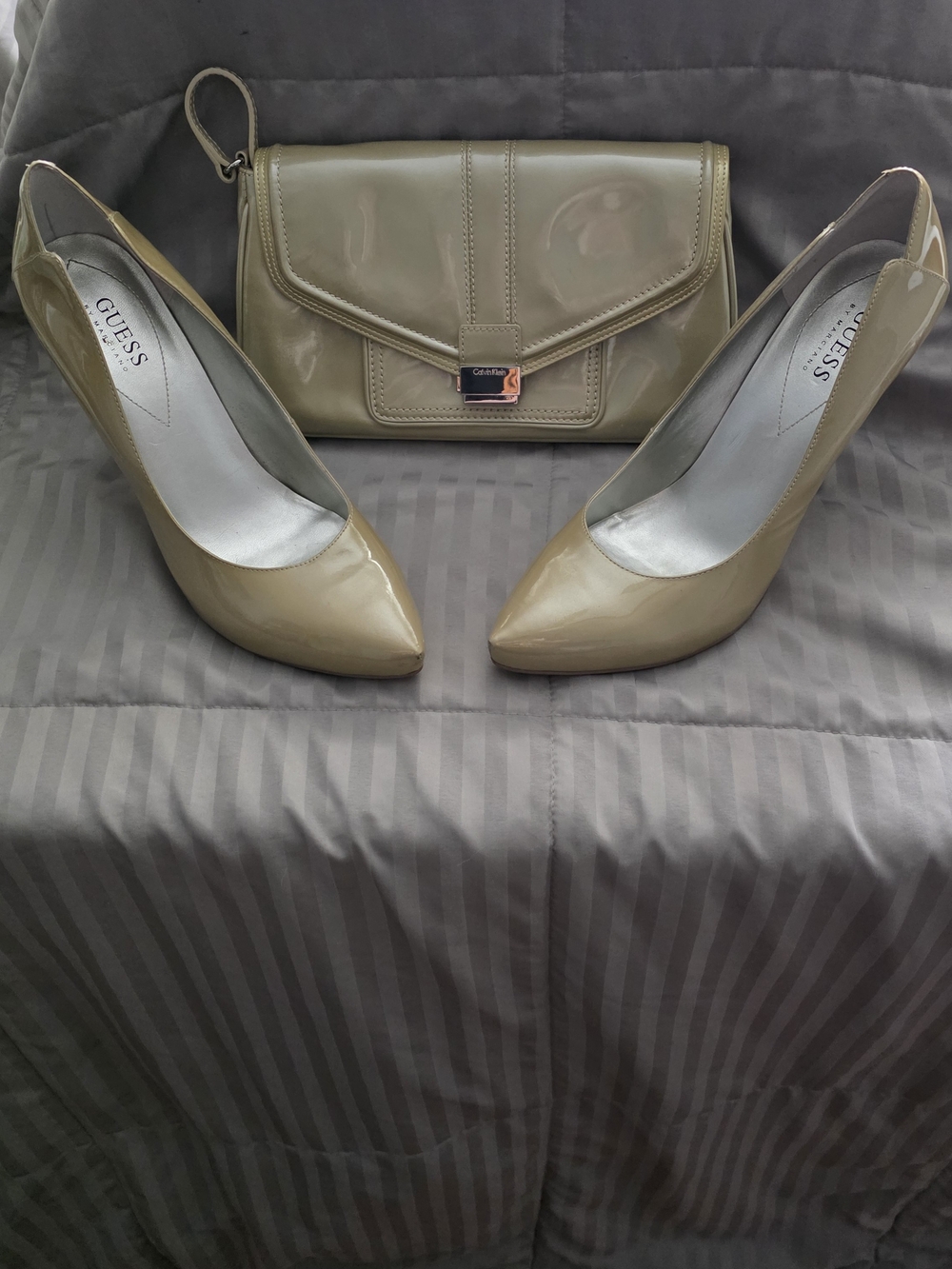 GUESS Patent Pointed-Toe Pumps in Taupe